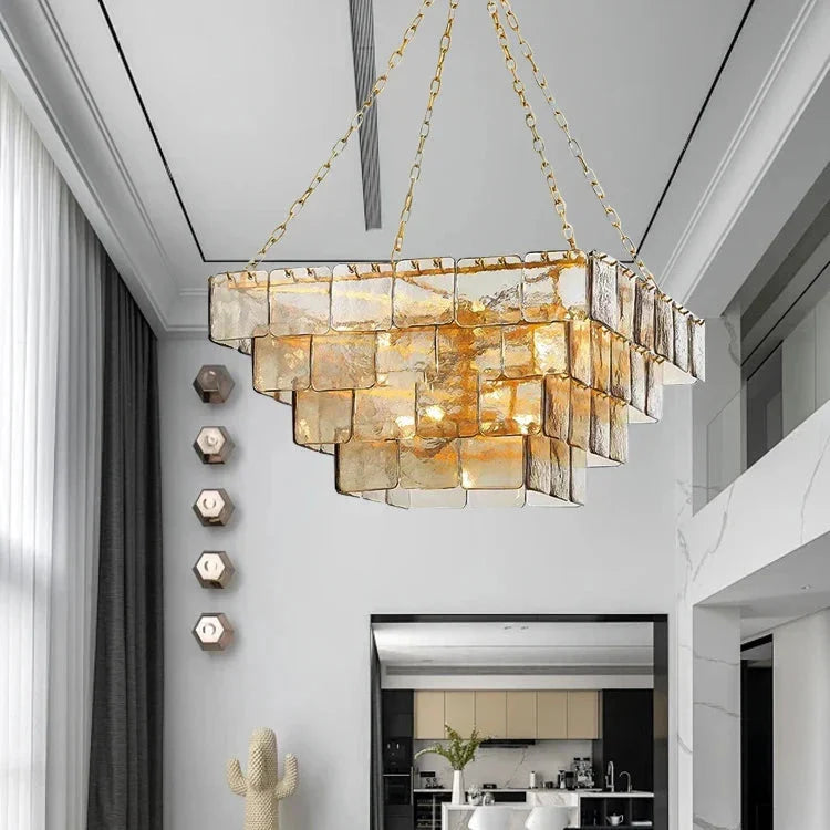 Different materials for modern chandeliers, including crystal, stainless steel, and copper options.