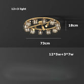 The Multi-Pendant Crystal Ceiling Light Fixture by Morsale.com is a luxurious lighting solution, featuring a gold circular chandelier adorned with handmade crystals against a black background. It has dimensions of 73 cm in diameter and 18 cm in height, configured with 12 small lights and 3 larger lights for an elegant touch.