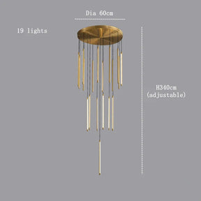 The Grande Brass Entryway Pendant Light Fixture from Morsale.com features 19 vertical light tubes of varying lengths, suspended from a round, gold-colored ceiling base. This modern chandelier boasts a polished gold finish, a diameter of 60 centimeters, and an adjustable height of up to 340 centimeters. The background is gray.