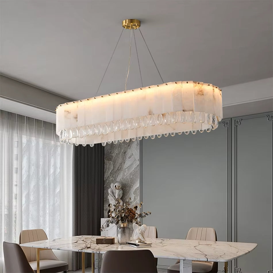 Stuart Modern Marble & Crystal Dining Room Chandelier enhances elegance with crystal illumination.