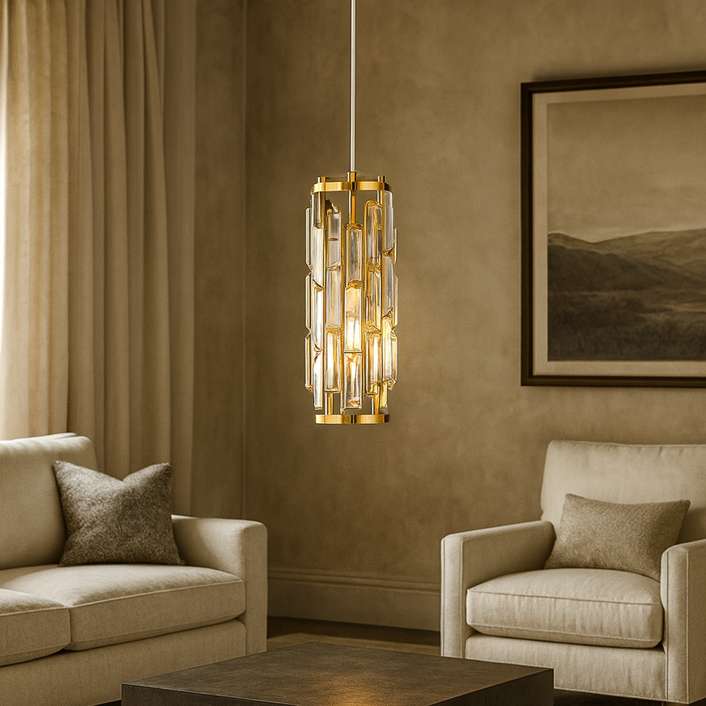 A modern living room with beige walls, a sofa, an armchair, and a coffee table. The Morsale.com Astoria Crystal Cage Pendant hangs from the ceiling, casting a warm glow on a framed landscape art piece.