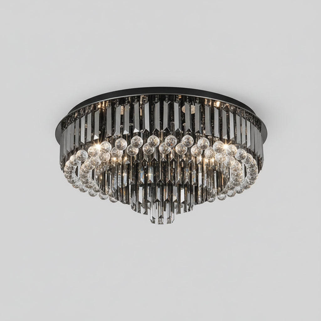 Chandelier hanging from a ceiling with a neutral background