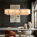 Elegant Oakley Layered Marble Dining Room Chandelier above a modern dining table, featuring dimmable LED lighting.