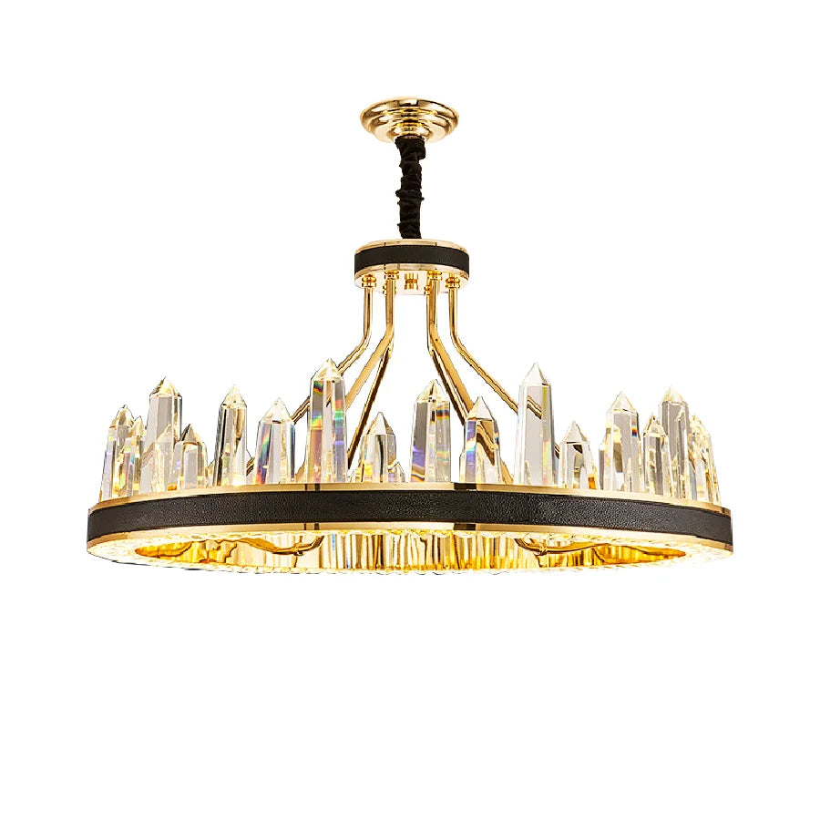 The Morsale.com Villa Contemporary Chandelier showcases a sophisticated black cylindrical base embellished with large clear crystals, arranged in an upright, crown-like design. It hangs from a black cord, providing warm, ambient light and is elegantly finished with gold-plated stainless steel accents.