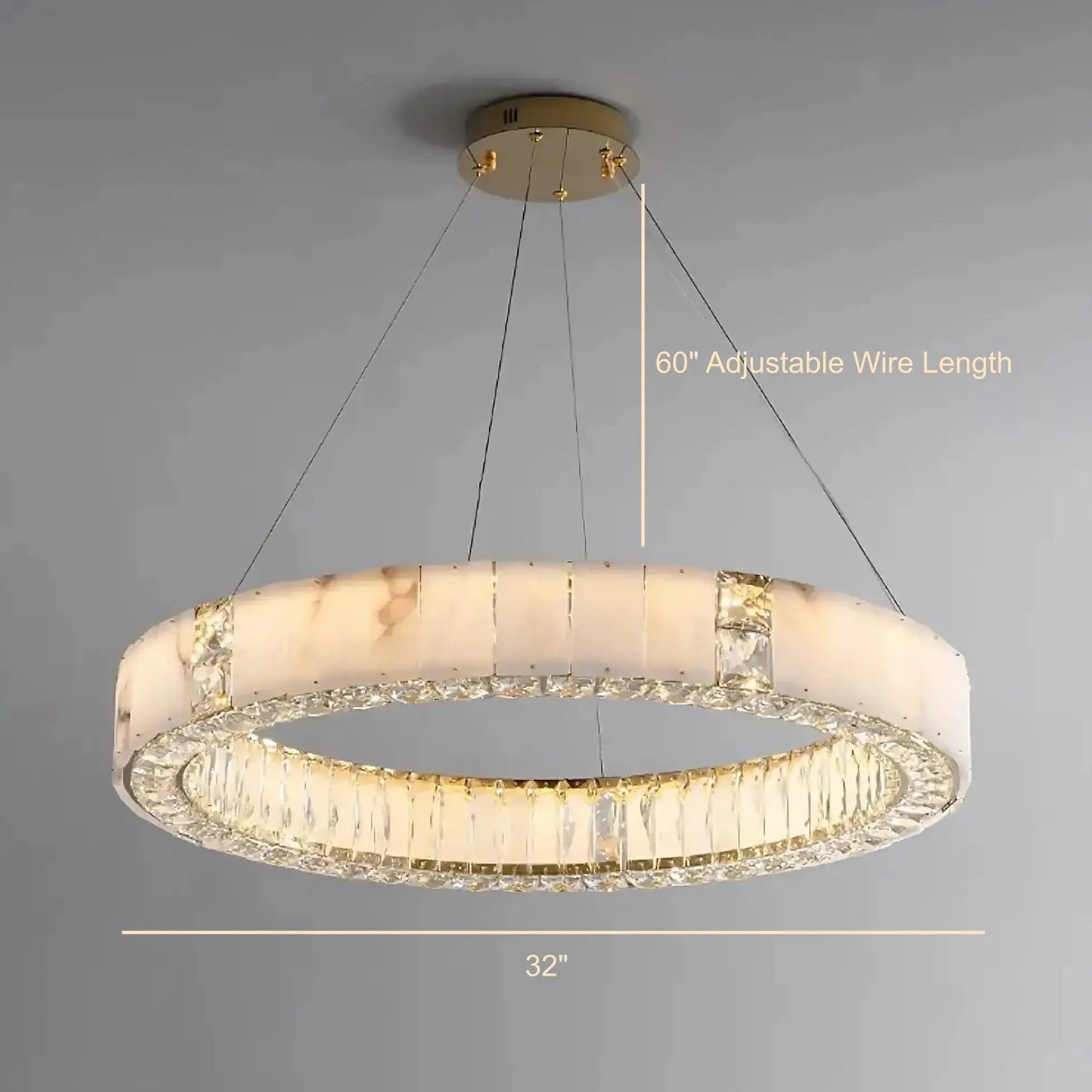 A circular chandelier with a modern design featuring a 32-inch diameter. It has a white and gold color scheme, with a translucent ring encircled by crystal-like elements. This Natural Marble & Crystal Modern Ceiling Light Fixture by Morsale.com hangs from the ceiling with adjustable wires, measured at 60 inches in length.