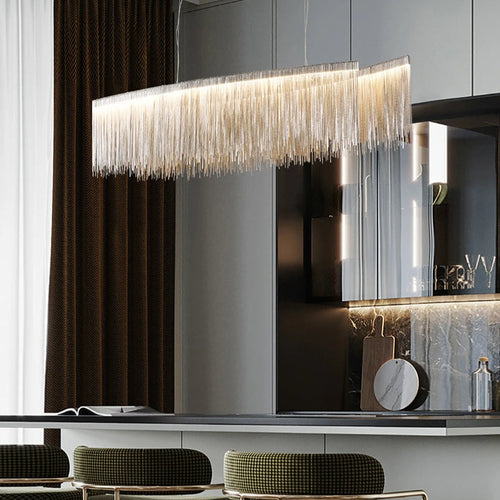 47" Cadena Dining Room Chandelier with stainless steel tassels, perfect for modern dining spaces.