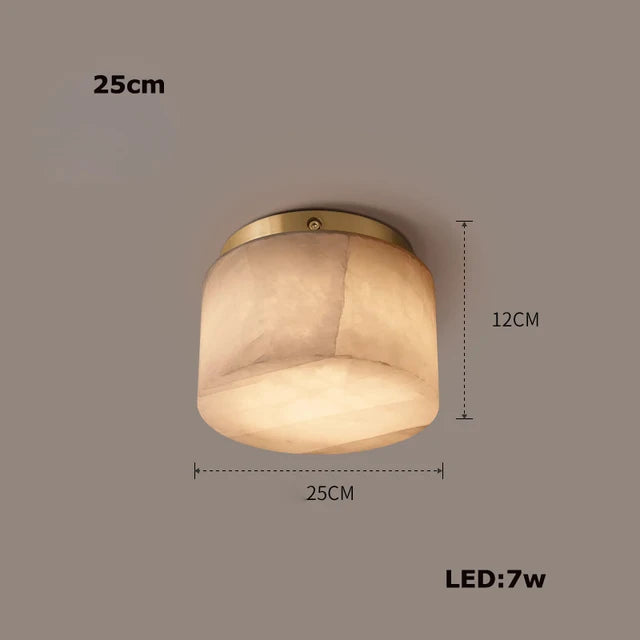 The Moonshade Natural Marble Ceiling Light Fixture from Morsale.com is displayed. It features a cylindrical shape with a frosted design and a gold-toned base. The fixture measures 25 cm in diameter and 12 cm in height, and it utilizes an energy-efficient 7W LED bulb, embodying modern minimalist aesthetics.