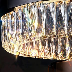 A close-up of the Siena Contemporary Crystal Light Fixture by Morsale.com showcases numerous elongated finest crystals refracting light, creating a dazzling array of colors and reflections. The intricate design and illumination give it a truly elegant appearance.