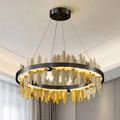 Rivaro Modern Brass Chandelier with unique dripped design and warm lighting enhances modern interior spaces.