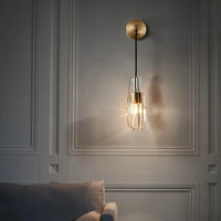 Barrow crystal wall sconce featuring polished copper and faceted crystal accents, ideal for elegant home lighting.