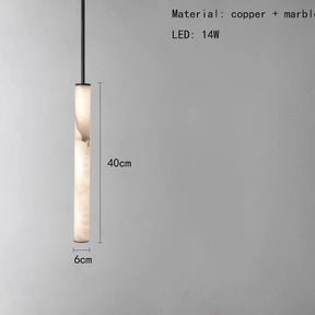 A sleek, cylindrical modern pendant light from Morsale.com, named the Natural Marble & Brass Pendant Light Fixture, hangs from the ceiling. It measures 40 cm in height and 6 cm in diameter. The text on the image specifies the materials as copper and marble with a polished copper finish and an LED power of 14W.