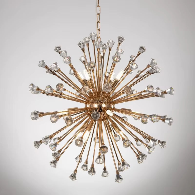 
                  
                    Gold and crystal chandelier on a gray background
                  
                