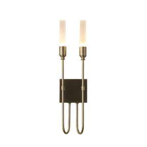 The Candela Contemporary Wall Sconce by Morsale features a rectangular base with two vertical, tubular LED lights. This modern lighting fixture, equipped with frosted glass covers mounted on metallic rods, showcases a sleek and minimalist design against a white background.