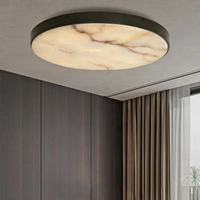 The Moonshade Marble & Copper Ceiling Light by Morsale, featuring energy-efficient LED bulbs and a round marble-patterned design, elegantly illuminates a modern style room with dark wood paneling and beige curtains.