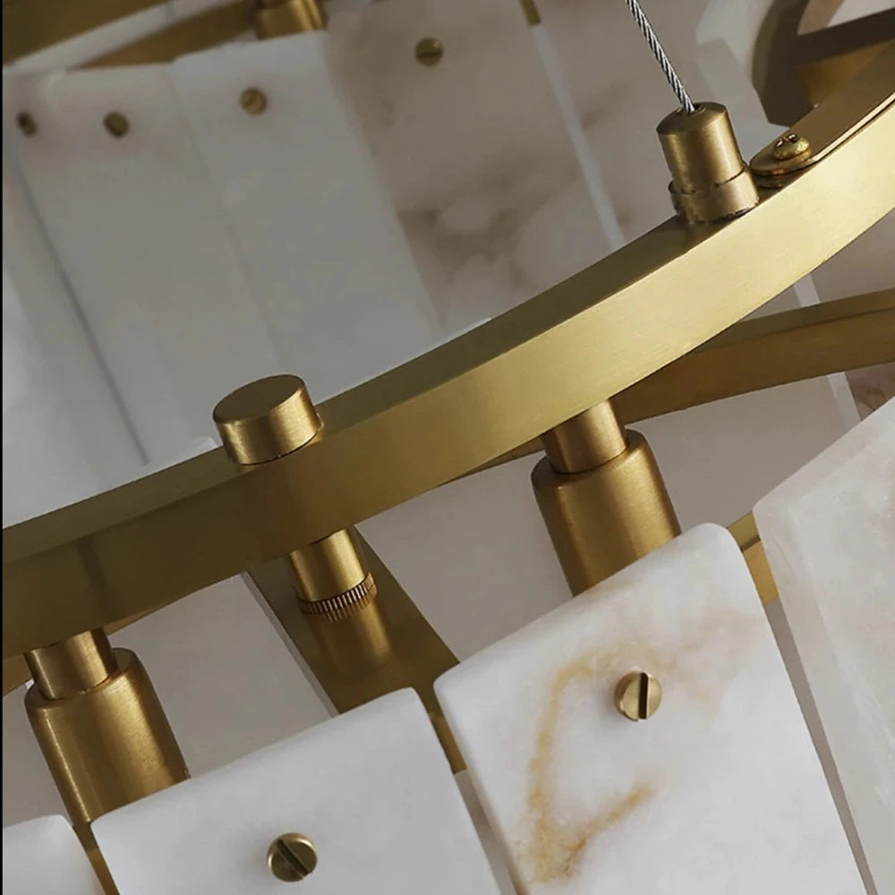 Close-up view of a Morsale.com 2-Tier Natural Marble Modern Chandelier with a golden frame, copper accents, and translucent marble-like rectangular panels. The chandelier features metal fittings and a sleek, contemporary design, highlighting the luxurious materials and craftsmanship.
