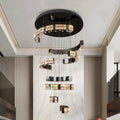 The Langley Crystal Foyer Chandelier by Morsale.com features multi-tiered handmade crystals, ideal for high ceilings in modern spaces, creating a warm and elegant glow.