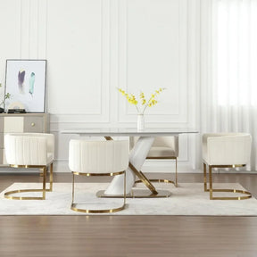 A contemporary dining room showcases a glass table paired with Morsale's Modena Dining Chair Set of 4, which features velvet white chairs and gold frames. A white vase with yellow flowers adorns the table center. In the backdrop, a sideboard with artwork and decor jumps to life in natural light, emphasizing its minimalist allure.