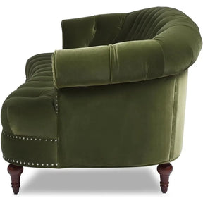 The Chesterfield Velvet Tufted Sofa by Morsale features an elegant olive green velvet design with a classic tufted back and seat. It’s adorned with decorative nail head trim and stands on dark wooden legs, ideal for those who admire timeless elegance in their living space.