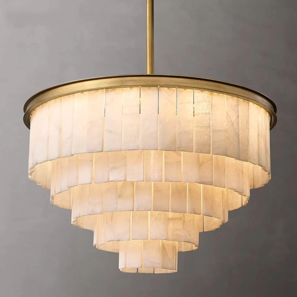 
                  
                    The Berkley Marble Chandelier by Morsale.com features a gold-tone brass frame with cascading tiers of Spanish marble-inspired, translucent rectangular panels, displayed against a plain gray background.
                  
                