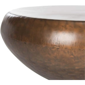 Close-up of the 39" Iron Coffee Table by Morsale, showcasing its textured brown surface with industrial charm. The image highlights the craftsmanship of its smooth, curved metal edges.