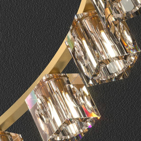 Close-up of the Morsale.com Multi-Pendant Crystal Ceiling Light Fixture with crystal rectangular prisms and a gold frame. The handmade crystals reflect light, creating a shimmering effect against a dark, textured background. This chandelier features an adjustable chain height to suit various room settings.