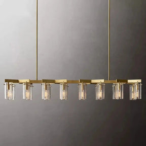 The Leroi Brass Dining Room Chandelier by Morsale features a modern, elegant design with a golden metal frame and eight cylindrical glass shades suspended in a row. This chandelier hangs from two vertical rods attached to the ceiling, set against a gradient gray background.