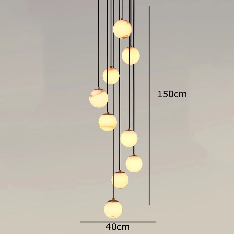 
                  
                    The Morsale Brighton Marble Ball Chandelier is a modern LED fixture with nine glowing spheres at varying heights, measuring 150 cm tall and 40 cm wide.
                  
                