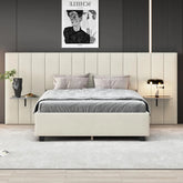A modern bedroom features the Morsale Amalia Velvet Queen Size Bed adorned with plush grey pillows and a blanket. Two sleek side tables display a vase and lamp, while an artistic poster on the dark wall highlights the minimalist decor. A light grey carpet elegantly complements the wooden floor.