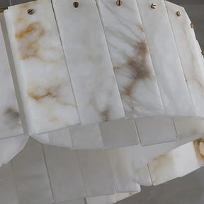 Close-up of a Moonshade Natural Marble Ceiling Light Fixture by Morsale.com, a contemporary LED light fixture made from translucent, rectangular marble slabs with veined patterns. The slabs are arranged in a circular formation and held together with small brass fasteners to create a modern and stylish chandelier.
