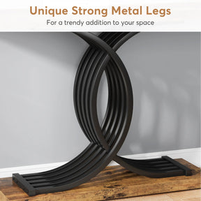 The Wexford Geometric Frame Console Table by Morsale features curved black metal legs forming an X shape, supporting a wooden tabletop against a gray wall. The text above states, "Unique Strong Metal Legs - For a trendy addition to your modern style space.