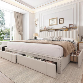 A spacious bedroom showcases the Morsale Alto King Size Bed Frame with built-in storage drawers. Brightened by a large window with sheer curtains and adorned with a potted plant, the room's neutral tones and framed art above the bed enhance its elegant ambiance.