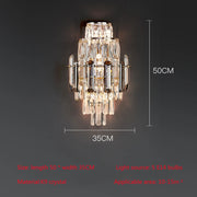 Enhance your room with the sophisticated Lazzo Crystal Wall Sconce by Morsale, a seamless fusion of modern lighting and timeless design. This wall-mounted masterpiece showcases layered hanging glass segments and is lit by five E14 bulbs. With dimensions of 50cm in height and 35cm in width, it is perfect for spaces ranging from 10-15 square meters.