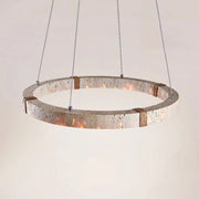The Morsale Natural Travertine Modern Light Fixture is a circular chandelier with a stone design, suspended by four metal wires. Featuring LED bulbs around its circumference, it emits a warm glow. The textured surface enhances its rustic charm with contemporary flair.