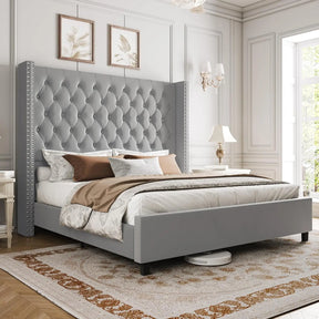A luxurious bedroom showcases Morsale's Velvet Tufted Bed with Headboard, complemented by beige and brown bedding. Elegant wall art hangs above, while a nightstand lamp enhances sophistication. A patterned rug decorates the wooden floor, and large windows invite natural light into the serene space.