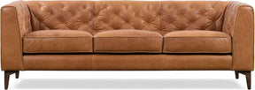 The Amalfi 89" Full Grain Leather Couch by Morsale features Italian-tanned brown leather, a tufted backrest, armrests, three seat cushions, and dark wooden legs. Its classic design with vintage patina makes it an elegant choice for any living room.