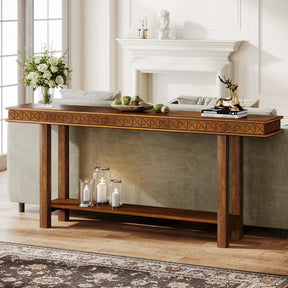 The Stanton Entryway Table With Storage by Morsale, featuring a modern wood design with geometric accents, beautifully complements the couch. It holds decor items like candles, green apples, and a gold deer sculpture while a vase by the fireplace enjoys soft light from large windows.