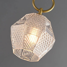 The Copper & Glass Pendant Wall Sconce by Morsale features a textured glass shade and warm LED bulb suspended from a copper fixture against a gray backdrop.