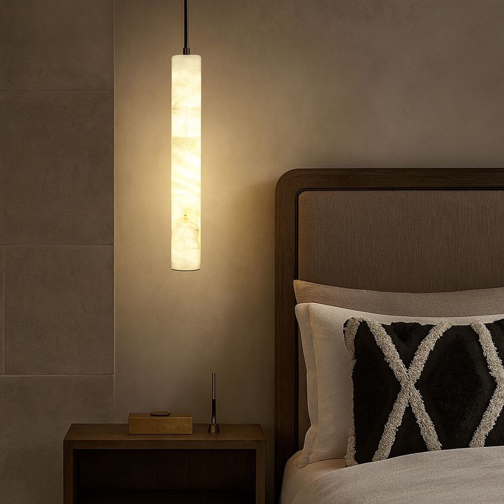 
                  
                    A modern bedroom with a wooden bed frame, beige bedding, a patterned pillow, a small wooden nightstand, and Morsale’s Moonshade Marble Pendant Lights hanging beside the bed for an elegant touch.
                  
                