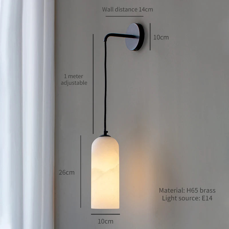 Introducing the Moonshade Natural Marble Wall Light by Morsale.com—ideal for enhancing your home decor. This stylish wall-mounted pendant light measures 10cm in width and 26cm in height, with a drop length of 1 meter and a wall projection of 14cm. Expertly crafted from H65 brass and featuring an E14 light source, it gently illuminates nearby walls and curtains, providing a chic alternative to traditional natural marble sconces.