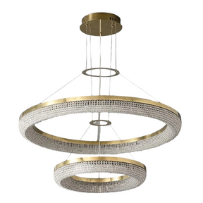 Introducing the Bergamo Double Ring Crystal Chandelier by Morsale.com: a luxurious masterpiece featuring two large circular rings adorned with handmade clear crystals, suspended by thin wires from a circular gold ceiling plate. The rings are of different sizes, with the larger one above the smaller, creating an elegant, layered look.