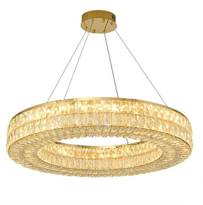 A luxurious Morsale.com Bacci Crystal Modern Chandelier, Gold, featuring a circular design with two stacked rings. Each ring is adorned with numerous sparkling crystals that emit a warm, golden light. This gold electroplated chandelier is suspended from the ceiling by four slender wires connected to a round, gold-toned base.