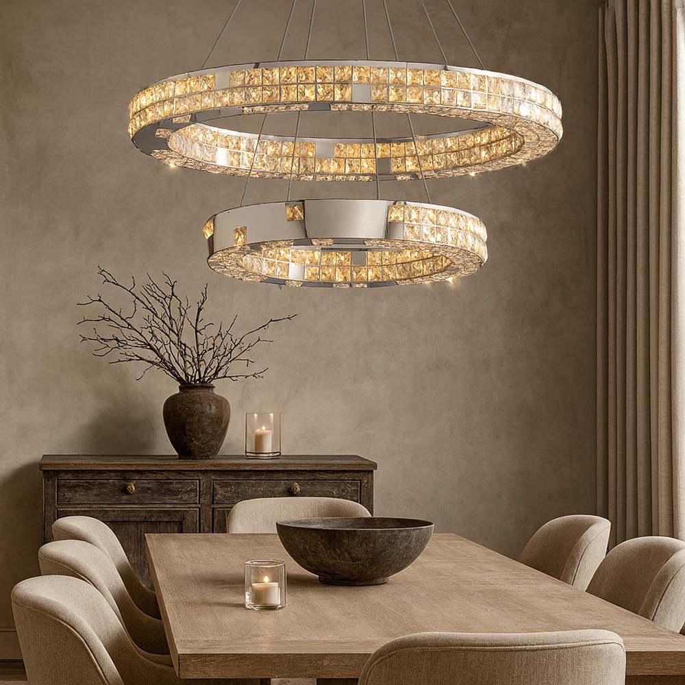 Elegant dining room with a light wood table, six upholstered chairs, and the Langley Modern Chandelier by Morsale.com featuring LED lighting. A wooden sideboard with vases and candles sits against a taupe wall, perfect for contemporary spaces.