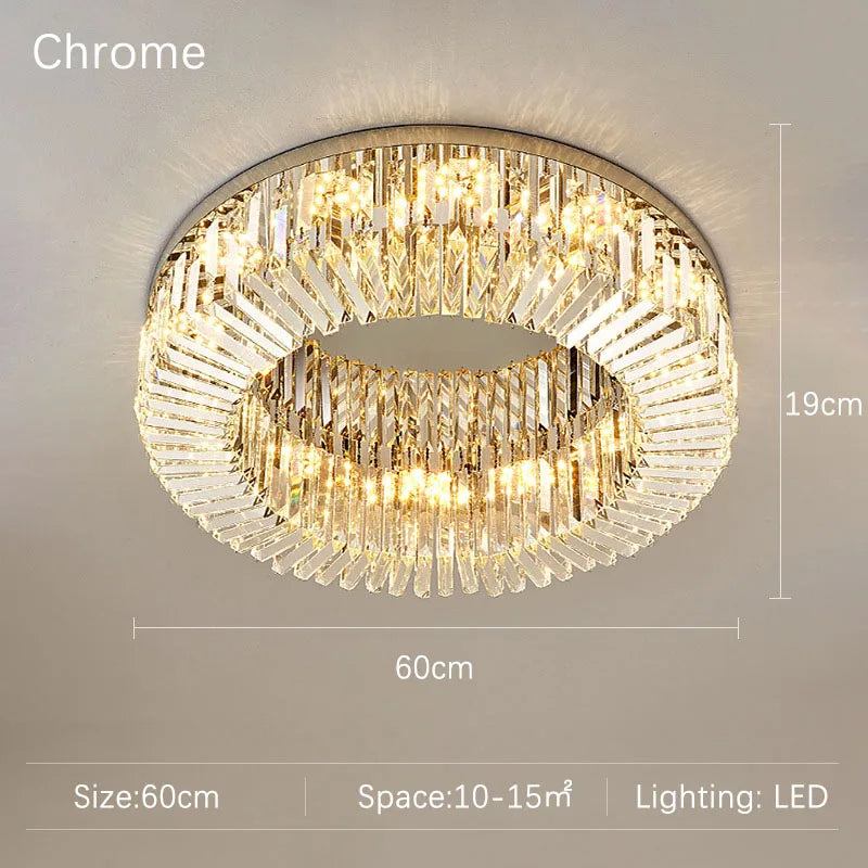 The Specchio Crystal Ceiling Light Fixture by Morsale.com is a round chrome chandelier with a 60cm diameter and 19cm height, adorned with clear crystal prisms and equipped with LED lighting. Perfect for modern decor, it is suited for spaces ranging from 10 to 15 square meters and emits a warm, elegant glow.