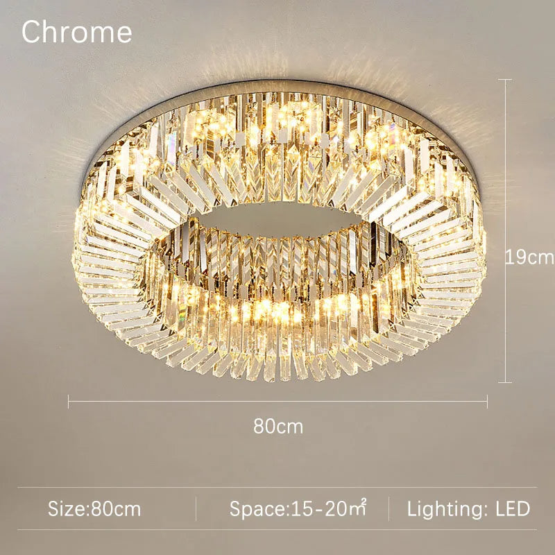 The Specchio Crystal Ceiling Light Fixture by Morsale.com features a sleek chrome design with clear crystals and LED illumination. Measuring 80cm in diameter and standing 19cm high, it is ideal for spaces between 15-20 square meters, making it a perfect addition to any modern decor.