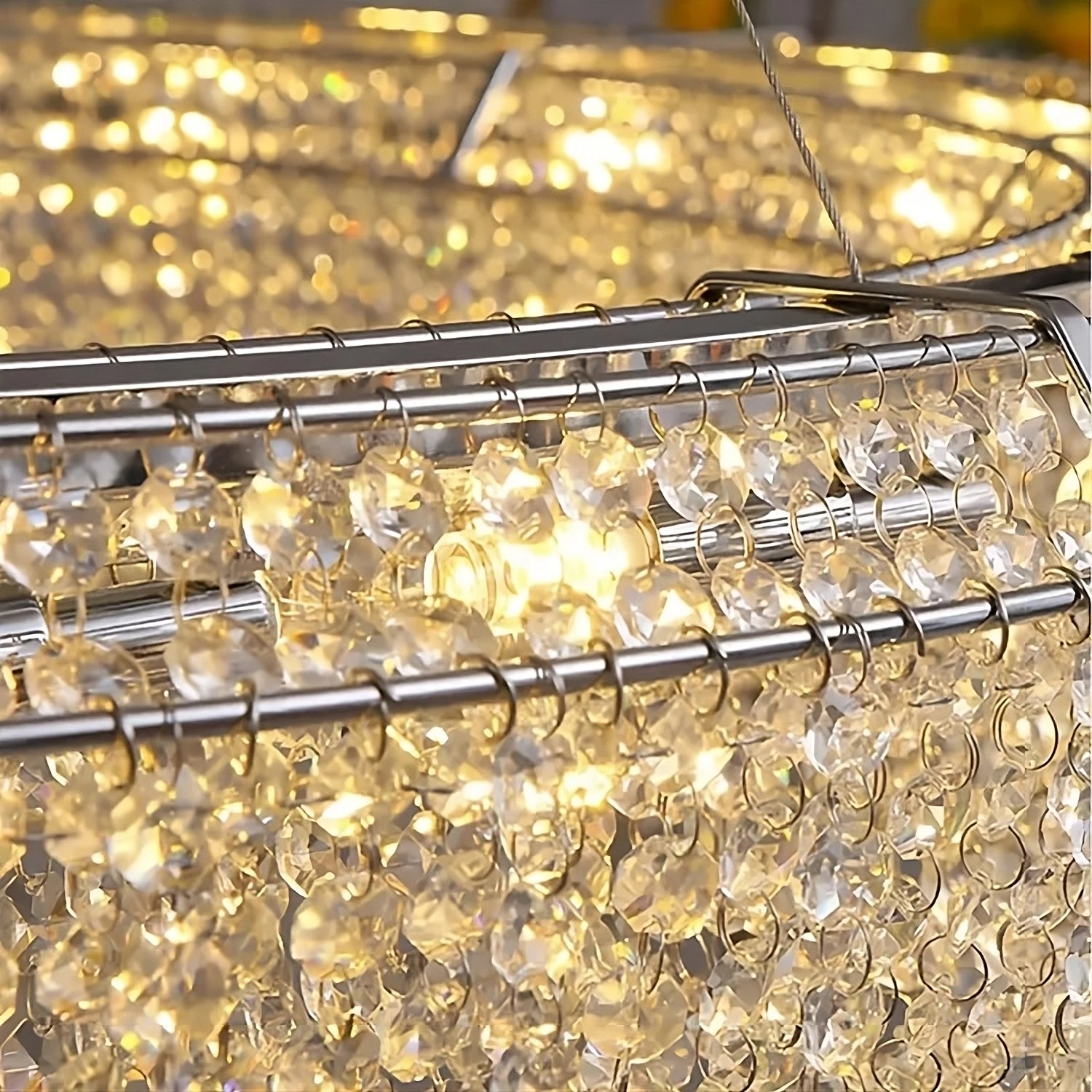 Close-up of the Alleri Crystal Chandelier For Dining Room by Morsale.com, showcasing its intricate metal framework adorned with numerous premium crystals. The illuminated beads create a sparkling effect, casting a warm glow that highlights its luxurious and elegant design, making it perfect for dining room lighting.