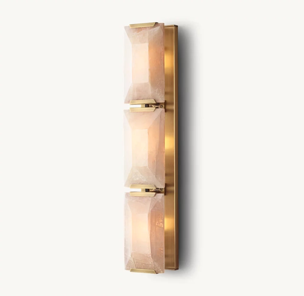 
                  
                    The Brookhill Calcite Crystal Sconce by Morsale.com features a brass base and three faceted crystal panels, offering a warm, soft glow—an elegant, handcrafted wall light perfect for refined interiors.
                  
                