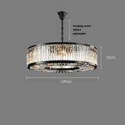 The Gio Crystal Modern Chandelier from Morsale.com features a stunning array of handmade crystals with a black frame that hangs from a 100 cm adjustable chain. The chandelier, measuring 100 cm in diameter and 25 cm in height, showcases vertically aligned prisms that elegantly encircle the light sources.