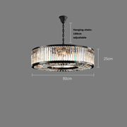 A **Gio Crystal Modern Chandelier** by **Morsale.com** featuring handmade crystals and a black metal frame with adjustable chain. The circular chandelier has dimensions of 80cm in diameter and 25cm in height. The 100cm hanging chain is adjustable, set against a plain gray background.
