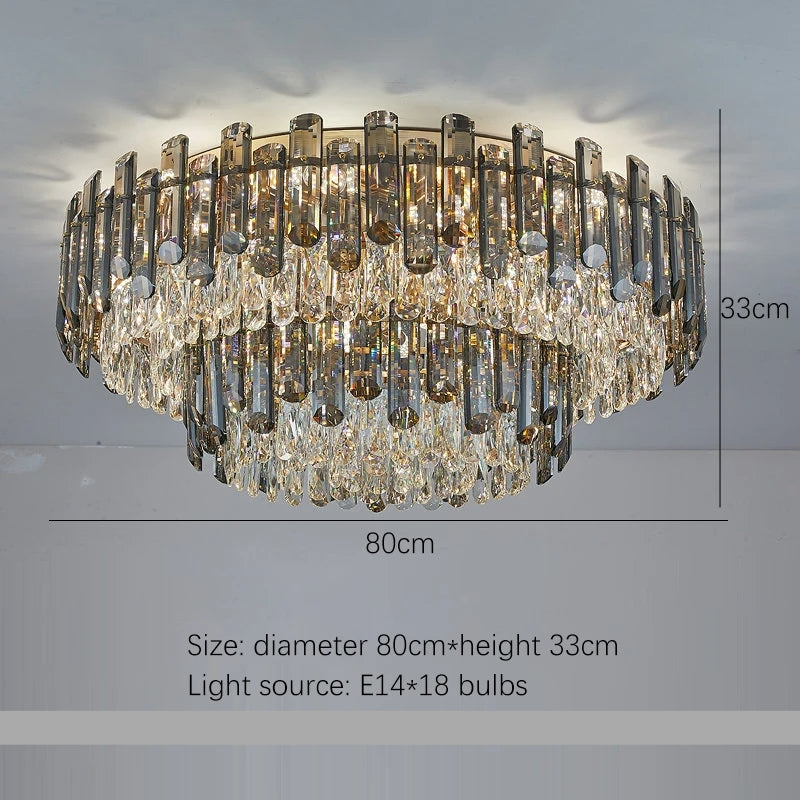 Introducing the Venice 2-Tier Crystal Chandelier from Morsale.com, a handmade chandelier with a diameter of 80 cm and height of 33 cm. This luxurious lighting fixture features multiple layers of crystal-like pendants and is illuminated by 18 E14 bulbs, embodying the pinnacle of luxury lighting.