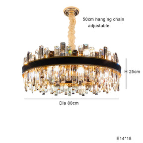 A Calvi Modern Chandelier with a round design featuring handmade crystals. It has an adjustable height with a 50 cm hanging chain, stands 25 cm tall, and is 80 cm in diameter. The chandelier's multiple faceted crystal pieces complement its E14*18 bulb specification for elegant lighting. Available at Morsale.com.